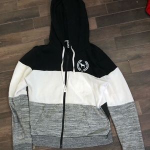 grey white and black zip up sweater